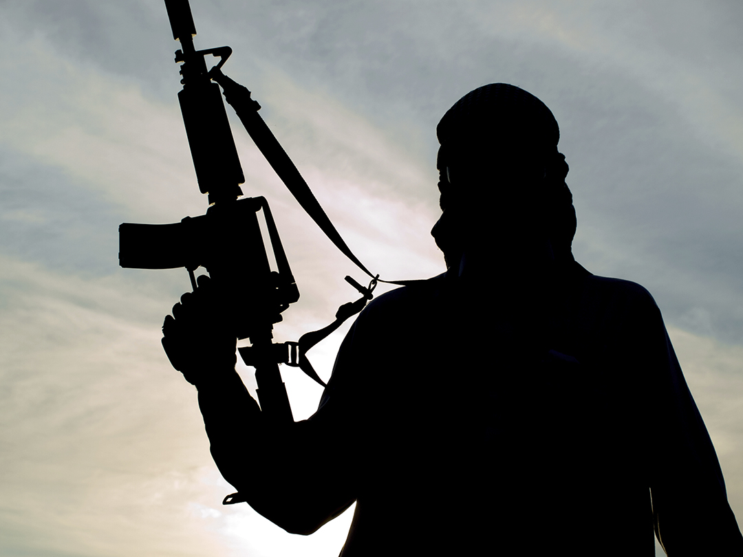 Silhouette of soldier with rifle